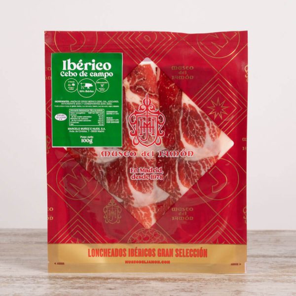 Jamón ibérico cebo campo loncheado en tabla Museo del Jamón