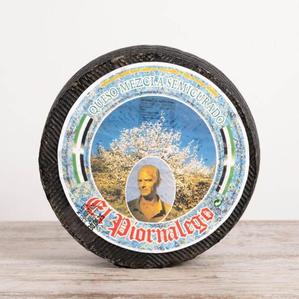 Whole wheel of El Piornalego semi-cured mixed cheese